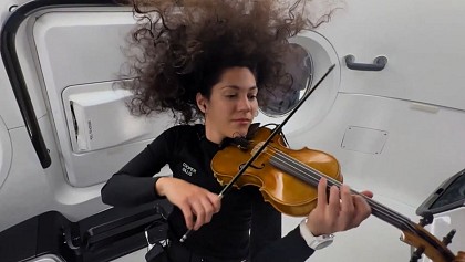 Sarah Levine plays violin in space