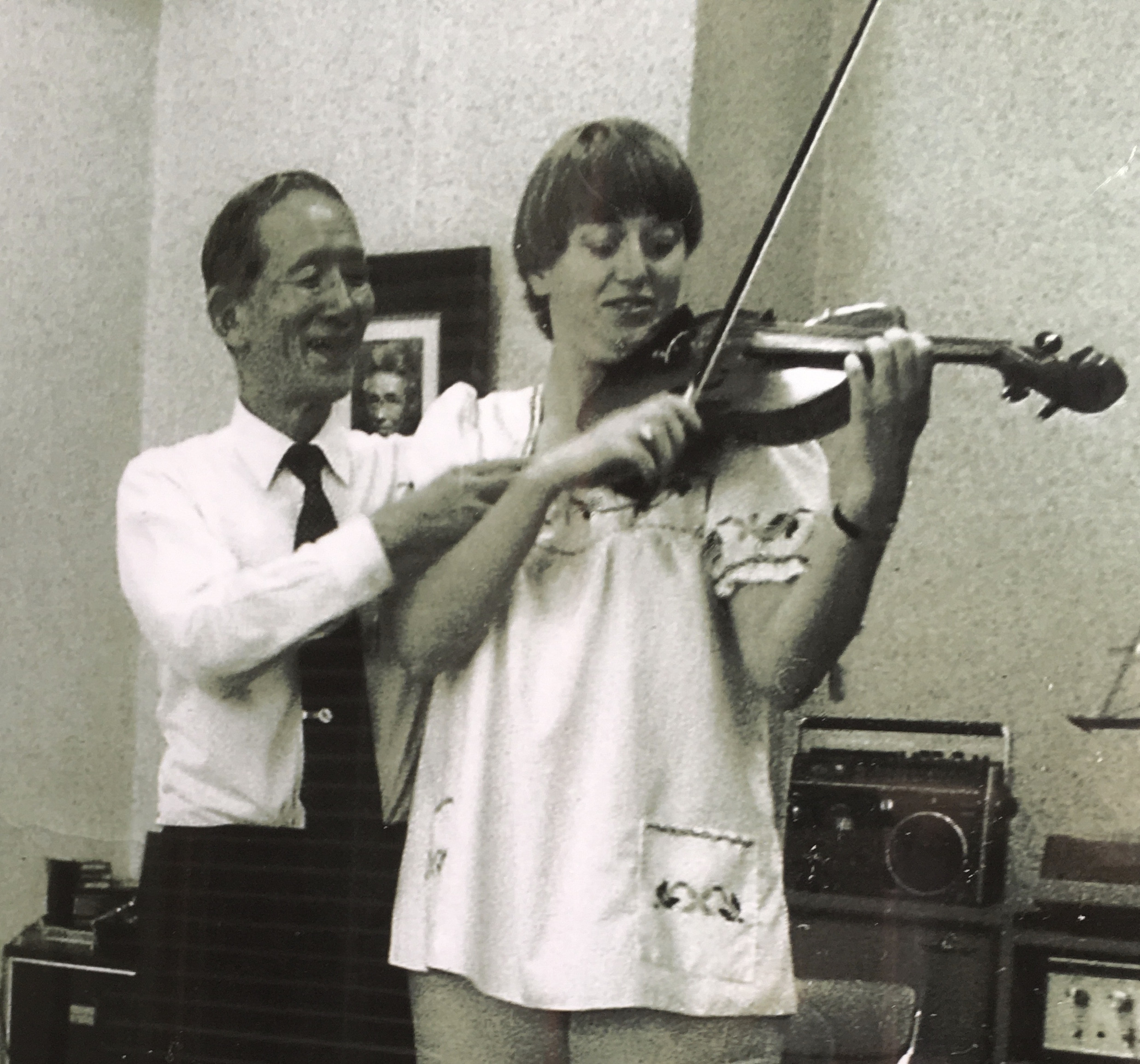 Judy taking a lesson with Dr. Suzuki